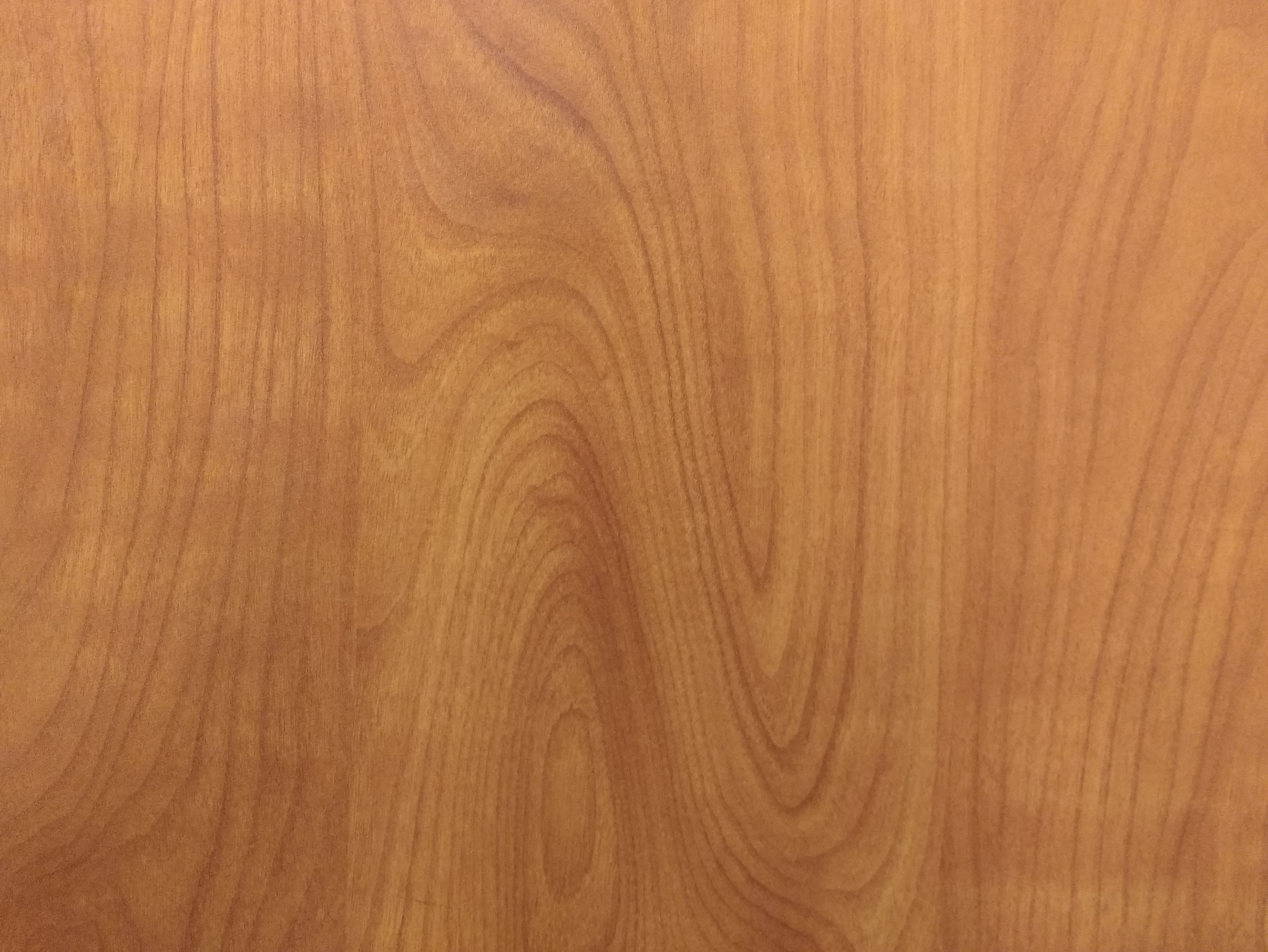 wood showing its undulating grain